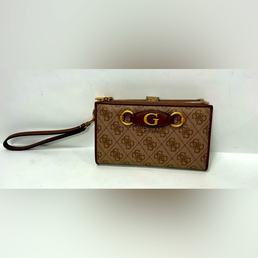 Woman’s Guess wallet one of a kind. Won’t find this wallet on the market place.